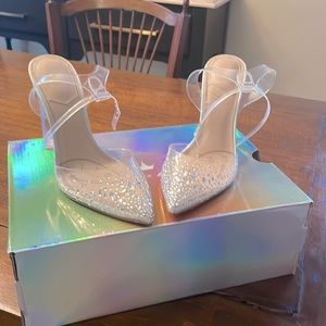 Glass slippers. Aldo clear and fake diamond heels. Worn once! Comfy and sturdy.